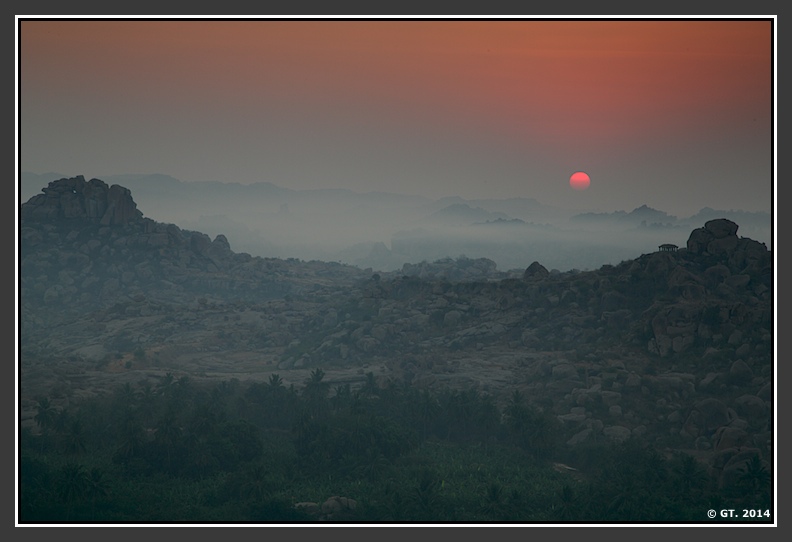 The main event begins… Sun rises over the numerous hillocks and brings various and brilliant hues of red, orange and yellow.